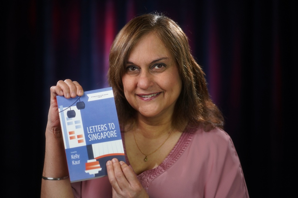 Kelly Kaur with her newly published book, Letters to Singapore